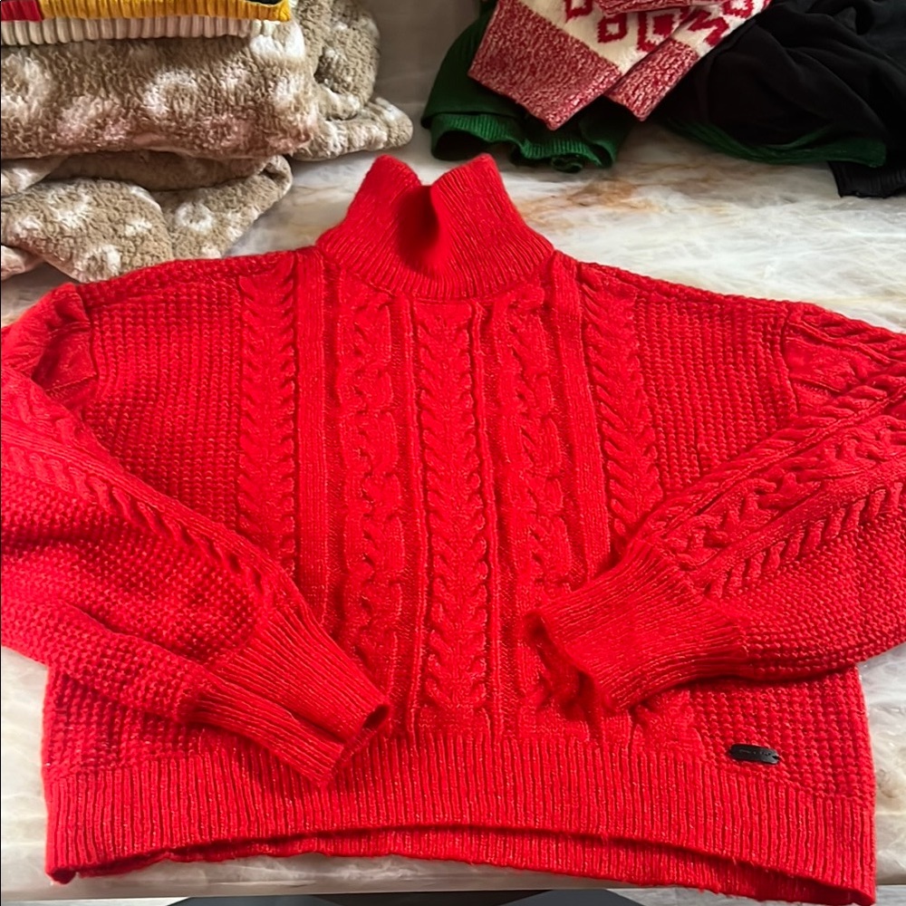 Red crop turtleneck sweater